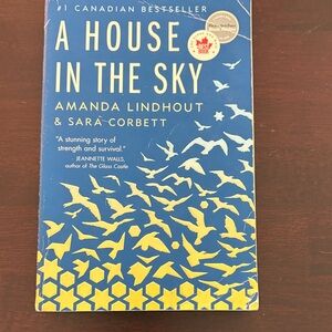 A House in the Sky by Amanda Lindhout & Sara Corbett - Blue & Yellow Paperback